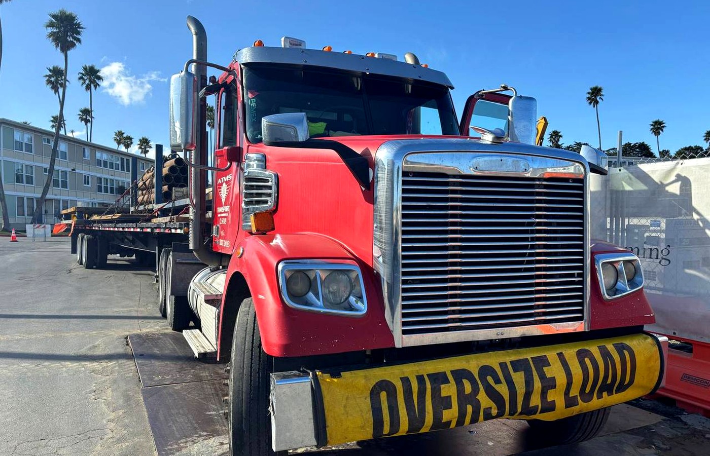 Abraham towing truck with oversize load sign
